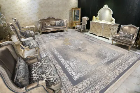 Grey acrylic carpet with a floral border in a classic sitting room with a carved sideboard